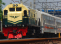 Kereta api Serayu ditarik Lokomotif CC 201 83 31 SMC dengan Ciri Khas Livery Vintage di era PJKA